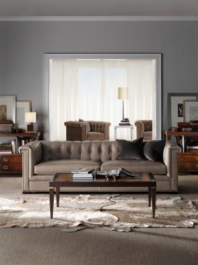 Room Scene: HC123-51 Kent M2M® Sofa at 103-inches and HC123-24 Kent Chair shown in 
Dark Walnut finish with NS-08 nail trim, HC176-51 Hutton M2M® Cocktail Table with
Beeswing Primavera veneer top shown as 54 x 30-inches in optional combination of
Espresso and Tawny finish with Antique Brass collars, HC177-51 Hutton M2M® Side
Table with Maple veneer top shown as 18 x 18-inches in White paint with
Antique Bronze collars and HC5476-10 Renata Console in Oxford finish.