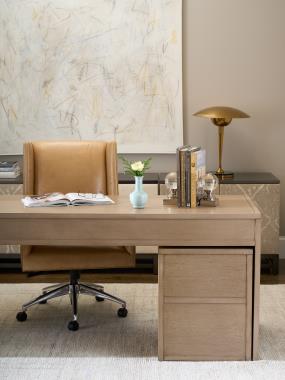 Room Scene: HC4601-DC – Mr. Ashford Desk Chair shown in HC147 leather; HC5394-70 - Harrison Four-Drawer Desk shown in Weathered Stone finish; HC5390-70 - Harrison File Cabinet shown in Weathered Stone finish; HC9571-70 - Remy Wood base shown in Pyrite finish; HC9572-70 - Remy 2 Door Upholstered Cabinet shown in HC4518-18 fabric with Pyrite finish and HC9573-70 - Remy 3 Drawer Upholstered Chest shown in HC9004-92 fabric with Pyrite finish.