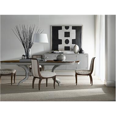 HC2444-76 Mercer Dining Table shown with Weathered Swedish Gray finish on base and the top in Dark Walnut finish, HC5351-02 LeeLee Side Chair shown in COM fabric with Dark Walnut finish and HC145-71 Artsan Grand Credenza shown in Weathered Swedish Gray finish.