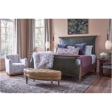 Room Scene: HC8662-10 Maren King Bed shown in HC146 leather and Truffle finish, HC8531-27 Luca Swivel Chair shown in HC483-73 fabric and Chestnut finish, HC8583-70 Beatrice Side Table shown in Truffle finish and HC8509-29 Fannie Ottoman shown in HC147 leather and Hable Grey finish.