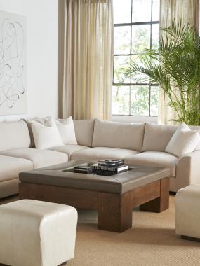  Room Scene:  HC974848-70U Mikos Cocktail Table – Upholstered Top shown in HC984 leather and standard Truffle finish, HC3008-53 Marney M2M Bench shown as 20x20-inches, in leather HC9004-92 and in standard Truffle finish, HC4400-08 Vistage Armless Love Seat and HC4400-05R Vistage RAF Corner Sofa with 8AA-8” Arched Arms, KEB-Bed Pillow Back and 8TB-Tapered Block Foot all shown in HC272-11 fabric and in optional River Rock finish. 
